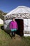 Altyn-Arashan, Kyrgyzstan, August 14 2018: A pretty Kyrgyz stands in front of a yurt in the valley of Altyn-Arashan in Kyrgyzstan