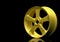 Aluminium alloy car wheel. Gold alloy rim for car, tracks on black background