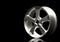 Aluminium alloy car wheel. Silver alloy rim for car, tracks on black background