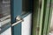 With the aluminium door handle, the green door is opened in the next room can occur