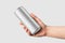 Aluminium drink can 250ml with water drops in a hand mockup template