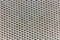 Aluminium mesh pattern on black background