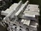 Aluminum alloy ingots stacked in the foreground