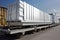 aluminum being transported via truck or train, with cargo overflowing