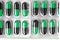 Aluminum blisters with colored black and green oval capsules neat flat lay