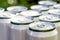 Aluminum closed white cans with beer close-up