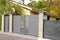 Aluminum design steel grey metal gate of modern suburb house entrance
