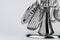 Aluminum holder with set of kitchen utensils on white background