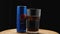 An aluminum Pepsi can next to a full highball glass against a black background. The camera flies around. There is ice