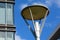 aluminum street light post. attractive circular lamp, milky glass lens. blue sky