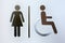 Aluminum woman and cripple toilet signs