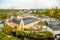 Alzette river bend with Saint Jean Du Grund cathedral and row of the houses behind, Luxembourg city, Luxembourg