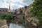 Alzette river Luxembourg city downtown Grund with fortifications and bridge