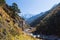 Ama Dablam mountain snow peaks, Imja Khola gorge canyon river.