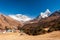 Ama Dablam and Mt. Everest peaks in Tengboche pass. Trekking in Nepal Himalayas. EBC Everest base camp trek trail upper part