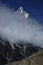 Ama Dablam and trekers in Himalayas