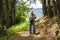 Amaga, Antioquia, Colombia. March 31, 2019. People walking through the countryside in mountainous landscape.