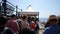 Amalfi, Italy - 3 September 2023. People waiting for ferry ride at Amalfi pier. Tourists waiting orderly in line on pier