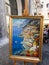 Amalfi , Italy - 3 September 2023. Traditional multi-colored painting depicting the Amalfi Coast