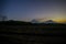 Amanecer en campo de costa con vista a volcan de snata maria quetzaltetango,