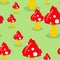 Amanita on meadow in forest seamless pattern. Red mushroom texture. Ornament of cute mushrooms.