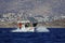 amateur fishermen returning from hunting with their small boats in the Aegean Sea.