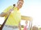 Amateur golfers. Low angle shot of a handsome older golfer standing in front of a golf cart with his golfing buddy