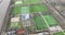 Amateur sports fields, american football, soccer, tennis, recreation and leisure. Aerial birds eye view.