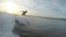 Amateur surfer rides the wave