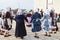 Amateurs in national dresses dancing breton dance