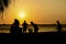 Amateurs playing football at Jumeira beach in Santa Marta, Colombia during sunset