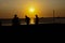 Amateurs playing football at Jumeira beach in Santa Marta, Colombia during sunset