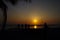 Amateurs playing football at Jumeira beach in Santa Marta, Colombia during sunset