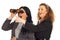 Amazed business women looking in binocular