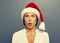 Amazed christmas woman in red hat