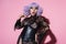 amazed drag queen in purple wig