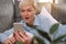 Amazed happy woman feeling great positive surprise reaction, holding smartphone and using mobile app at home.