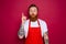 amazed isolated chef with beard and red apron