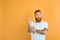 Amazed man with beard, tattoo and white t-shirt