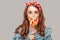 Amazed pinup girl ruffle blouse licking sweet candy looking at camera, eating delicious confectionery lollipop with surprised