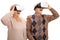 Amazed senior couple experiencing virtual reality