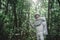 Amazed spaceman has walk in forest