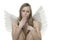 Amazed woman with angel wings amazed