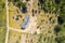 Amazing aerial overhead view of the Chilean countryside. A rural house with its farmland and the forest trees. Idyllic scenery