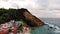 Amazing aerial shot of Morro de Sao Paulo hill and Lighthouse at cloudy sunset