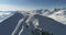 amazing aerial shot of snowy peak in Georgian mountains. Slowmotion drone video