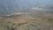 An amazing aerial view above Yerba Loca valley at Central Andes from the German Shelter. Two hikers enjoying the awe views of the