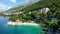 Amazing aerial view of the beautiful Podrace beach in Brela, Makarska Riviera, Croatia. Aerial view of Podrace beach and