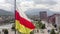 Amazing aerial view of the flag of North Ossetia. Vladikavkaz city, General Pliev square