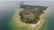 Amazing aerial view historical island with archeological buildings and ruins sand beach ancient landmark famous tourist